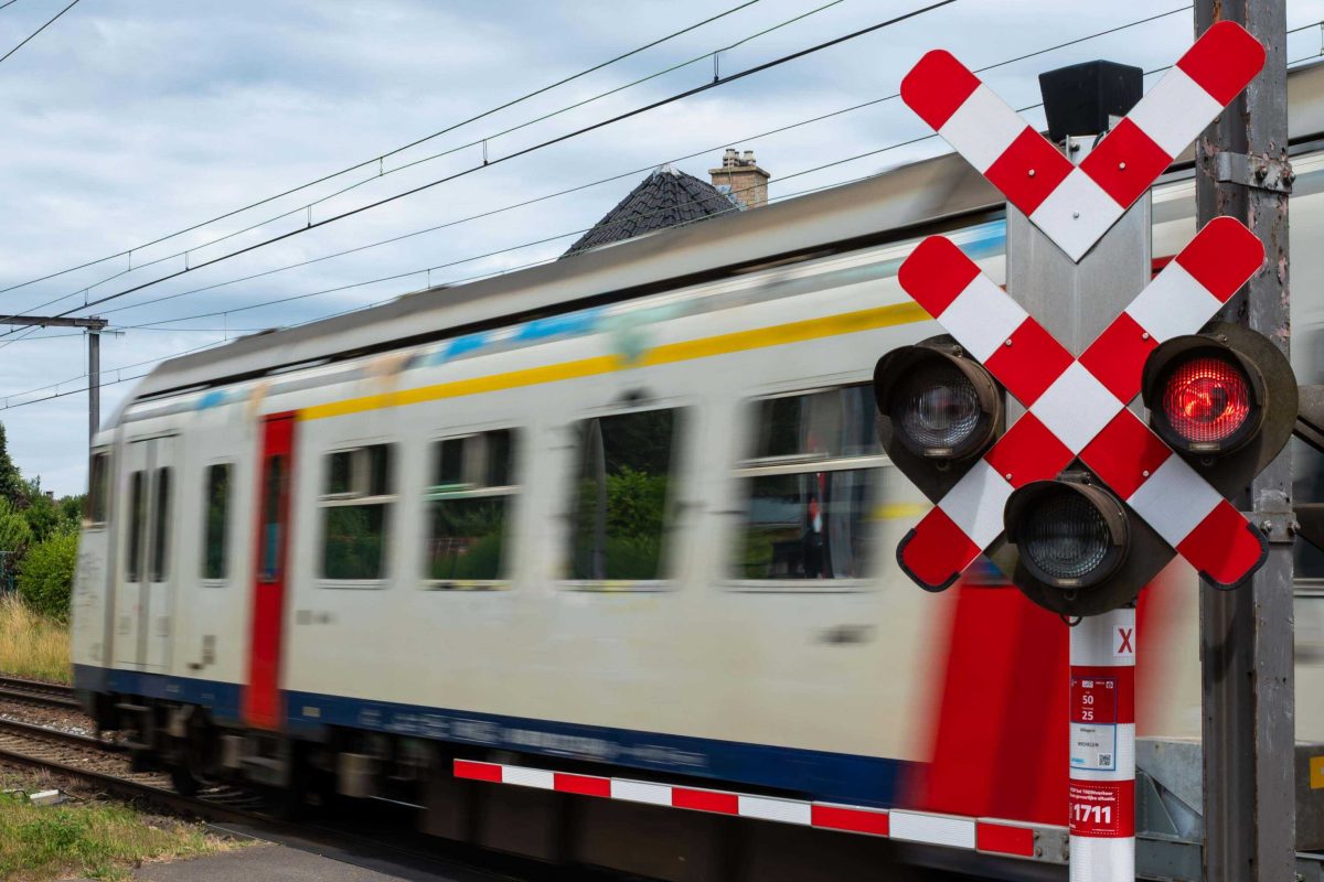 Train crossing in the rural area of Serskamp, Wichelen, East Flanders, Belgium 5 July 2025